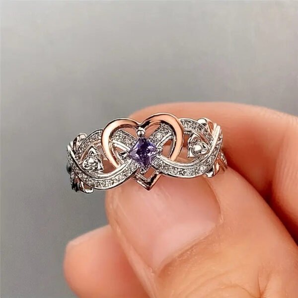 58ff9111299b79d5cc5040b2c059a0be_6fe915bc-a2eb-470a-972b-40800a24775c Delicate Purple Sapphire Women's Heart Two-Tone Ring
