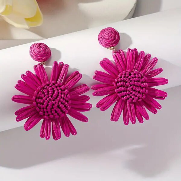 b35a9c29ce0418db5b753ffd9056d457 Hand-woven Raffia Sun Flower Dangle Earrings